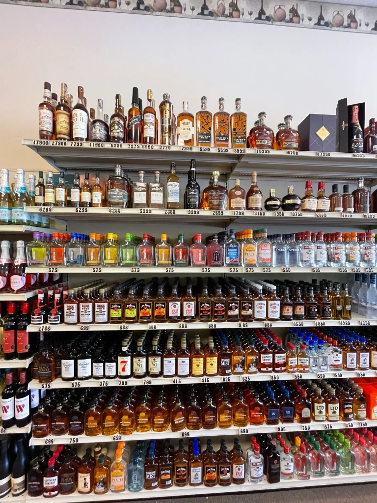 A view of our store shelves, including Paul Masson, Smirnoff, and New Amsterdam.